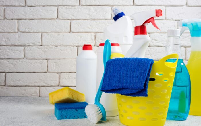 Cleaning background. Basket with cleaning products. Cleaning with supplies, service and clean house