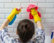 House cleaning. Woman is cleaning in the bathroom at home
