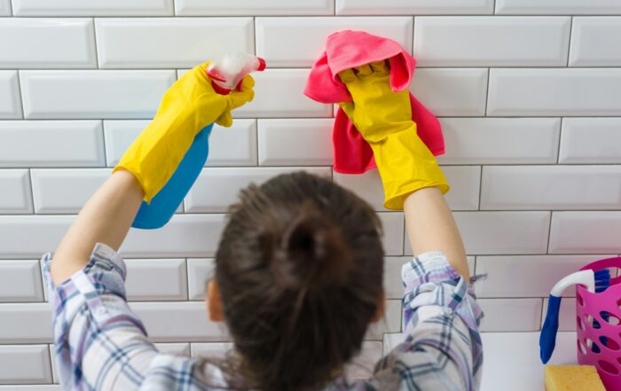 House cleaning. Woman is cleaning in the bathroom at home