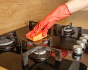 Deep Cleaning Gas Stove Burners with Sponge